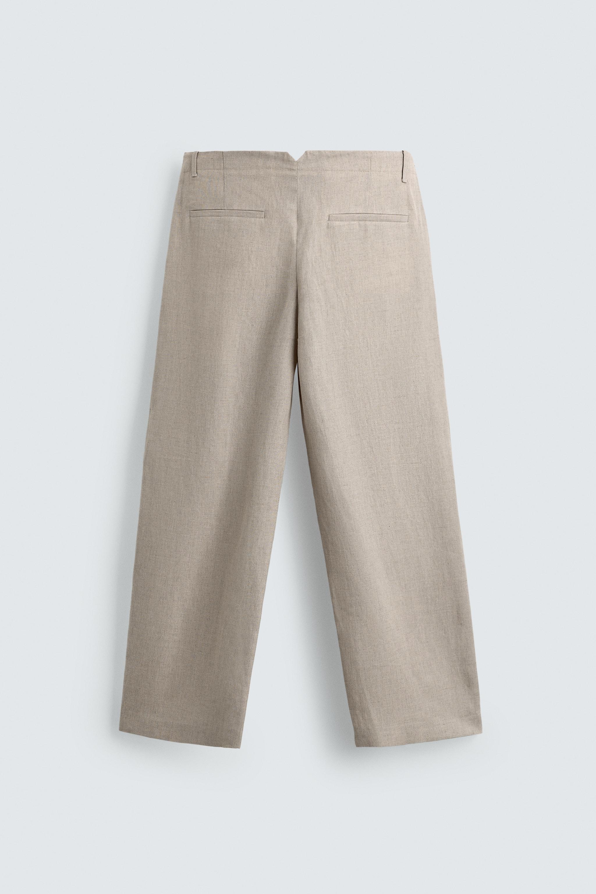PANTALON À PLIS EN COTON ET LIN